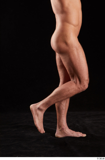 Larry Steel  1 calf flexing nude side view 0001.jpg